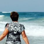 Couple Walking on beach cropped for investment services