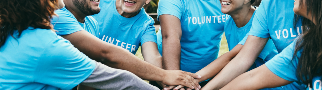 Volunteers in Blue Shirts