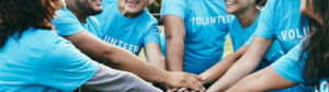 Volunteers in Blue Shirts