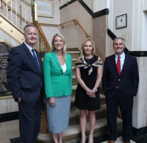 Advisory Board Members Standing With Board Members