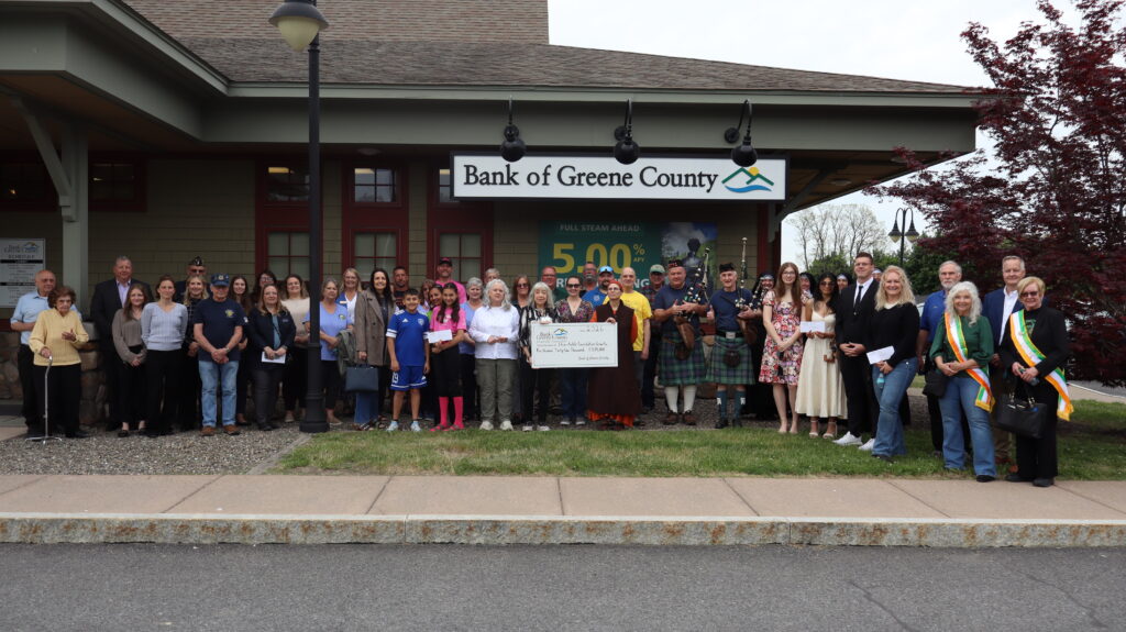 Cairo branch charitable ceremony group picture with big check