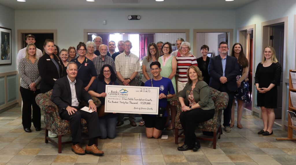 Coxsackie branch charitable ceremony group picture with big check