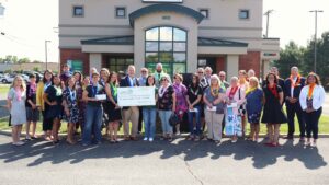 East Greenbush branch charitable ceremony group picture with big check